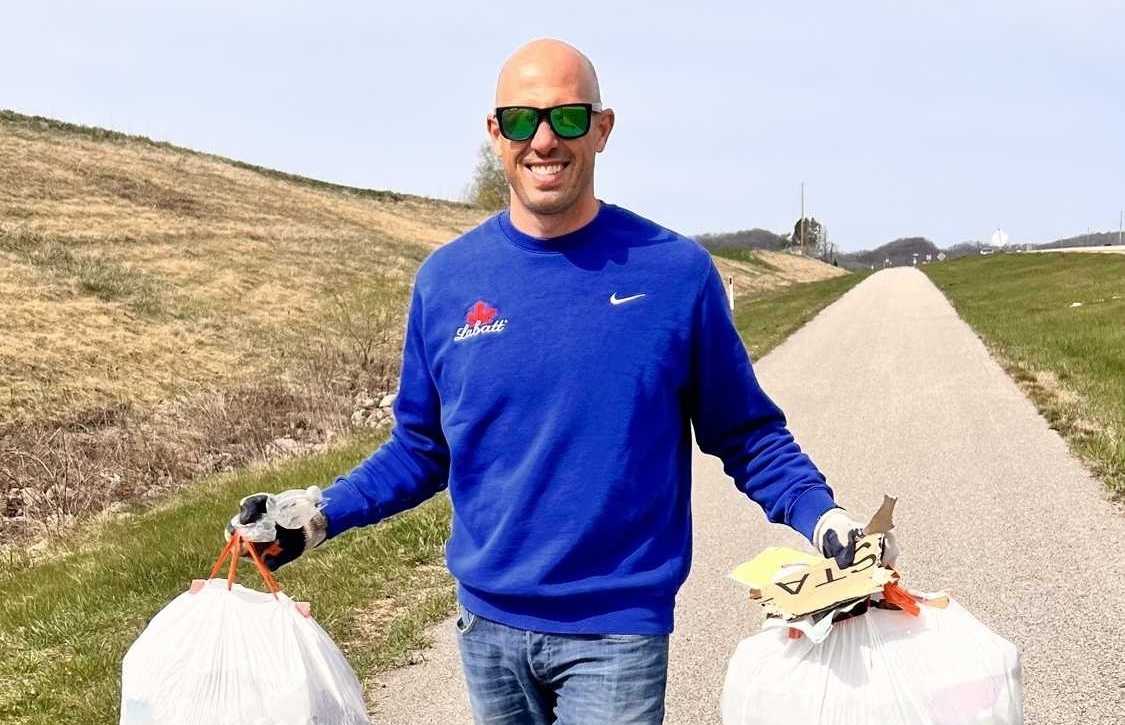 A North American Breweries employee volunteering at an outdoor event